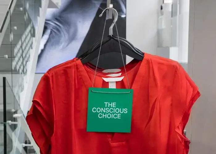 Red H&M T-shirt with green Conscious Choice Label